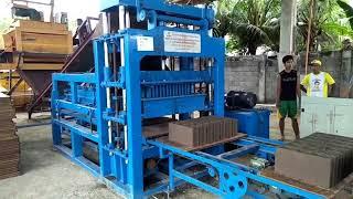 Working in Cambodia QT5-20 automatic hydraulic concrete block making machine brick production line