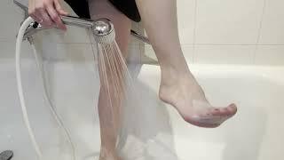 Wetlook - shower in pantyhose and skirt