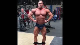 Incredible Shredded Pro Bodybuilder flexing his rock hard muscles.