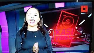 Zandi Wardle as Kasi Vibes Guest TV Presenter