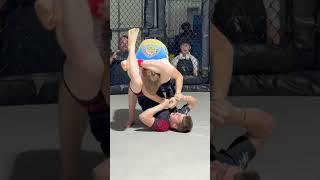 BJJ triangle choke attempt in the cage.