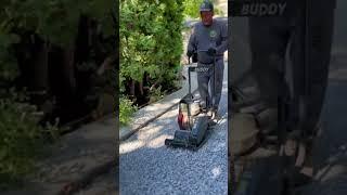 Installing and Finishing a Permeable Resin Bound Driveway by Dream Pave.