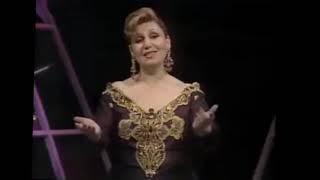 Mualla ŞENTOP-Ayrılık Ümitlerin Ötesinde Bir Şehir (HÜZZAM)R.G.