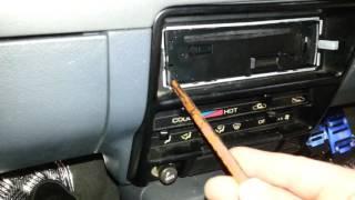 How to remove  a PIONEER radio from it mounting cradle