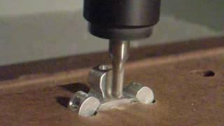 My home-made CNC router milling some aluminium