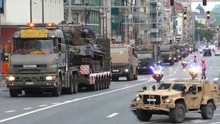 Huge convoy of tanks and military vehicles escorts by police during the National Day in Brussels!🪖