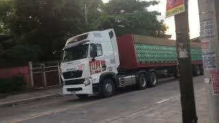 Light White AVTC Polo-H16 Howo A7 Tractor Head with Red Beer Transport in Examiner Street