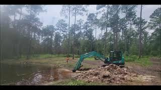 Building a Pond Dam With the Excavator