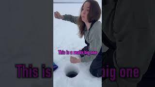She pulls up a GIANT PIKE while ice fishing