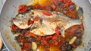 Orata in padella con capperi pomodori e olive      Bream in a pan with capers tomatoes and olives