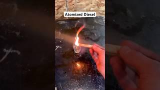 Burning atomized diesel