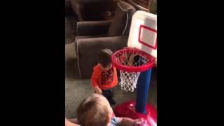 Javie Lents jr and sibby playing basketball