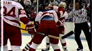 Mike Peluso fights Rick Zombo with Bob Probert third man in, Sep 19, 1990