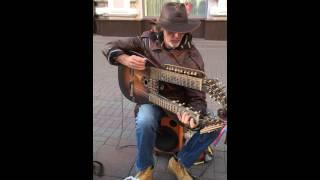 Sergey Sadov playing his music at Arbat Street, Moscow, Russia