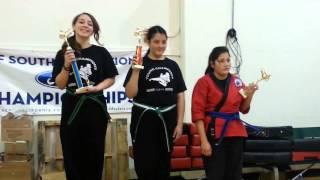 Ashley wins first place sparring young champions.