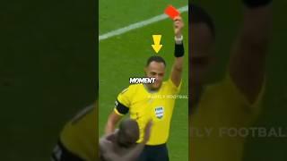 This referee laughs while giving a red card