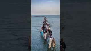 In Somalia, People walk in sea, Magic.