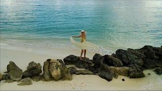 Maldives, Sun Island,  a girl on the beach, honeymoon, shooting from a quadrocopter. 3/4