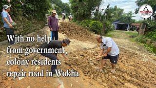 With no help from government, colony residents repair road in Wokha