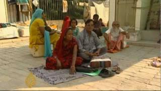 India urged to offer universal healthcare