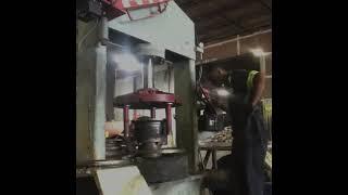 Changing 7.00-12 solid forklift tires on Nissan lift using Press Machine