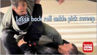 lasso guard sweep  ( back roll ankle pick )