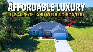 We Toured An AFFORDABLE NEW Florida Home With 1/2 ACRE OF LAND - NO HOA/CDD!