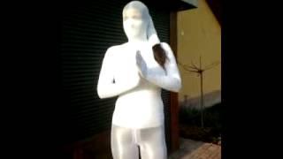 Encasement over shiny leggings and turtleneck white