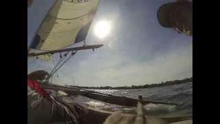 Tanzania Tanga sailing a Ngalawa with a trimaran sail.