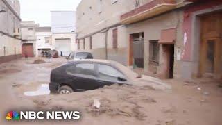 Rivers of mud in Valencia region as Spain experiences deadly flash flooding