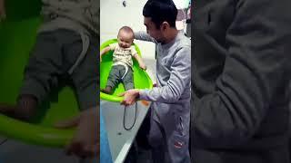 baby Rasul with dad#shorts#baby#family#funny#like#play#trend#dubaisubscribe#bathroom#swimming#water