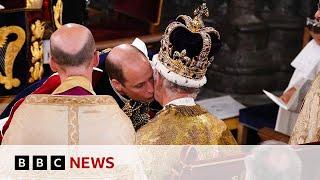 Prince William kisses King Charles on cheek in Coronation ceremony - BBC News