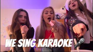 The girls sing karaoke