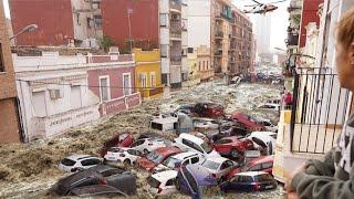 Mass evacuation in Valencia, Spain! Buildings, cars and bridges collapse in Valencia