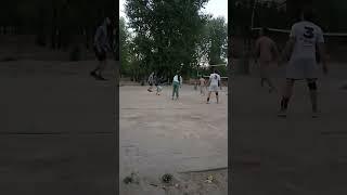 Beach volleyball, a strong throw of the ball into the center.