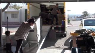 Moving a Heavy Load into a Moving Truck