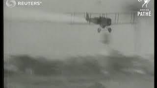 DEFENCE: Display showing two airmen escaping from plane hit by shell (1910)