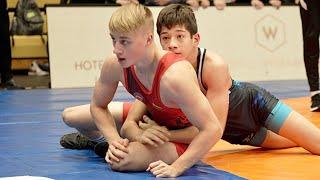 U15 Ronaldas Pogozelskis (LTU) vs Sultan Kusht (FIN) 57kg. Greco-roman boys wrestling. B-cam-man