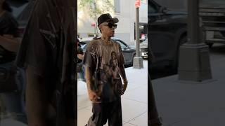 Lena Waithe pairs her Alvin Ailey shirt with colored sneakers! #lenawaithe #style #artist #urbanwear