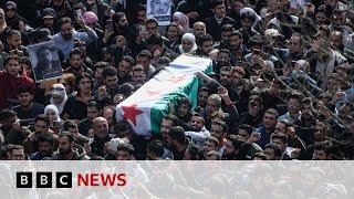 Hundreds gather in Damascus for Syrian activist's funeral | BBC News