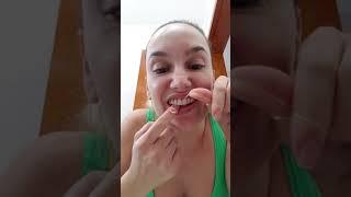 Como passar o fio dental corretamente.