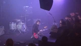 A Place To Bury Strangers. Oliver Ackermann and John Fedowitz tune the guitars before the show.