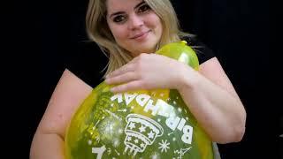 She loves hugging big colourful balloons