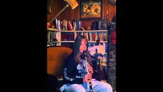 Katie Madrak playing clarinet (with motivation from Dad)