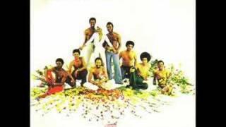 Earth Wind and Fire "World Is a Masquerade"