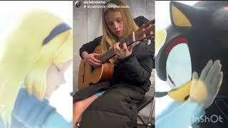 Alyla Browne (Maria Robotnik) playing Live & Learn guitar solo behind the scenes