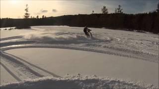 Snowmobile Donuts on Ice and Drag Racing