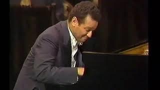 Andre Watts plays: Claude Debussy's "La Plus que Lente", "Danse", and  "L'Isle Joyeuse."