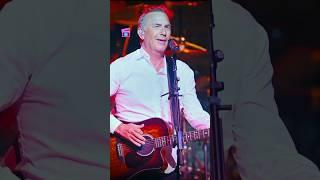 Kevin Costner, currently 70, singing and playing guitar.