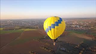 Hot air balloon above French country side